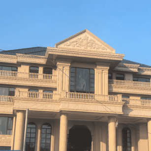 山西黄金麻别墅外墙干挂石材效果示例