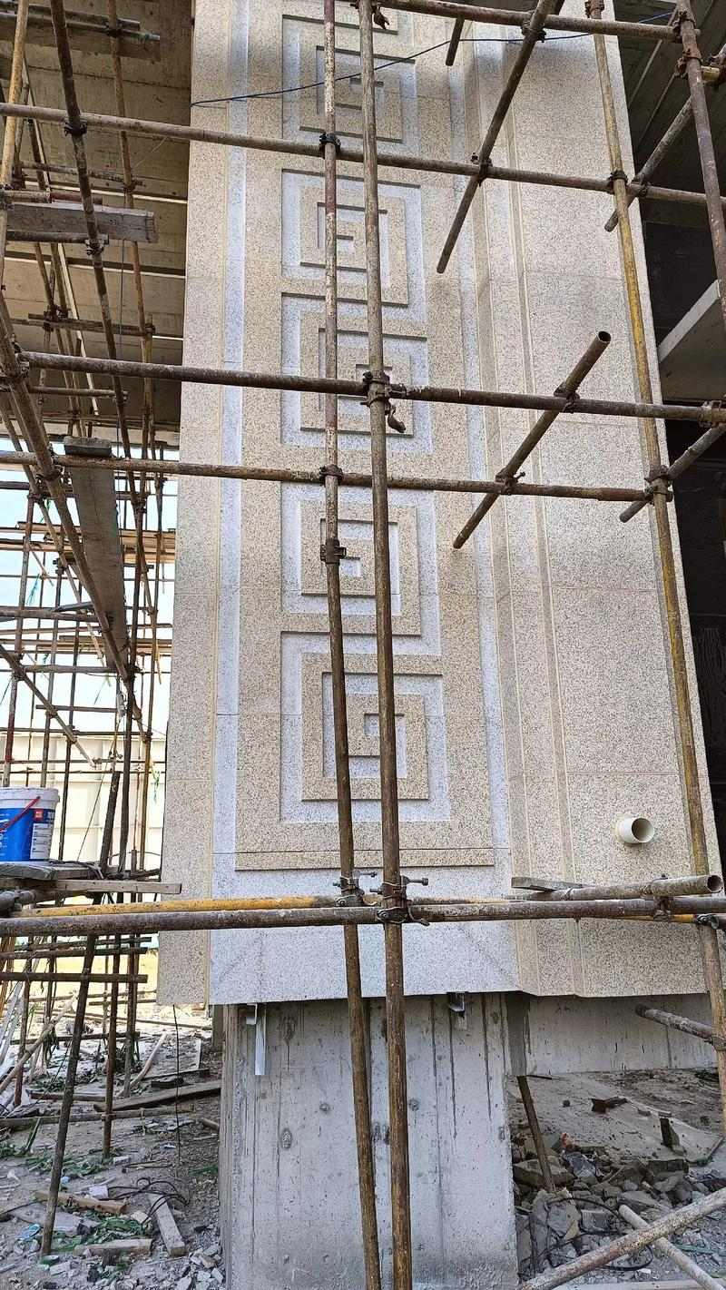 山西 黄金麻花岗岩别墅外墙干挂回纹造型效果