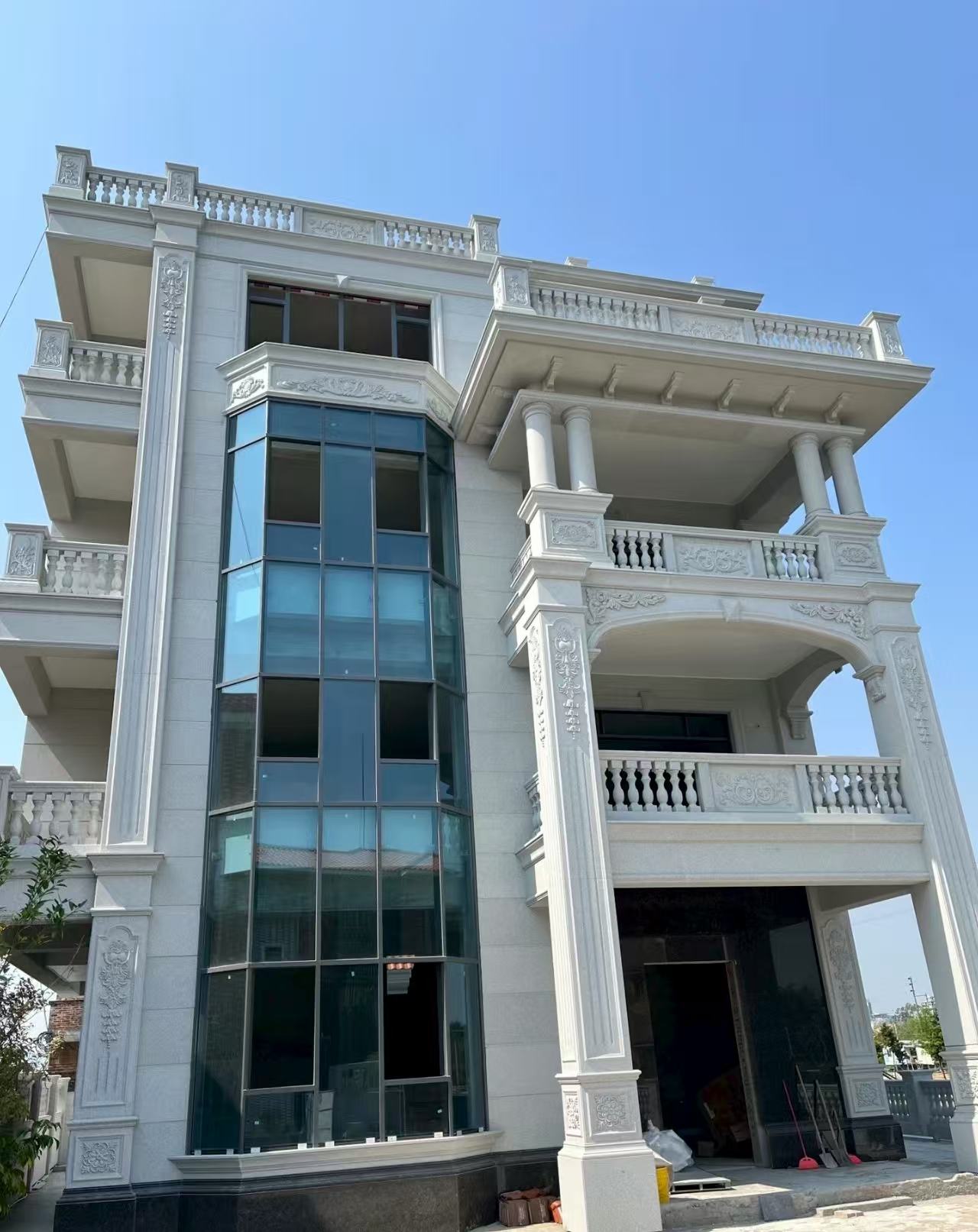 山西 白麻花岗岩别墅外墙干挂效果展示